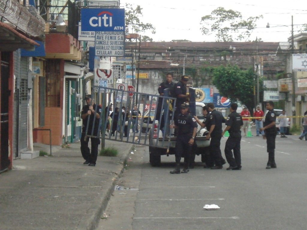 Police carry barricades