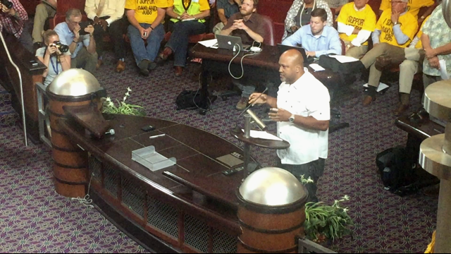 Derrick Muhammad, ILWU Local 10 Business Agent, speaking against coal before the Oakland City Council on Sept. 21, 2015. Photo by Jennifer Sargent Bokaie