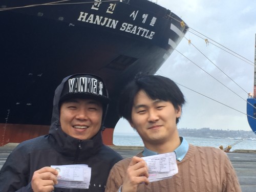 Chinese crew members from the Hanjin Seattle celebrate their shore leave. Customs officials changed their policy after solidarity efforts from the ILWU and support from lawmakers in Washington.
